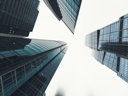 Modern skyscrapers from low angle view Structural Engineering Services - Commercial Design